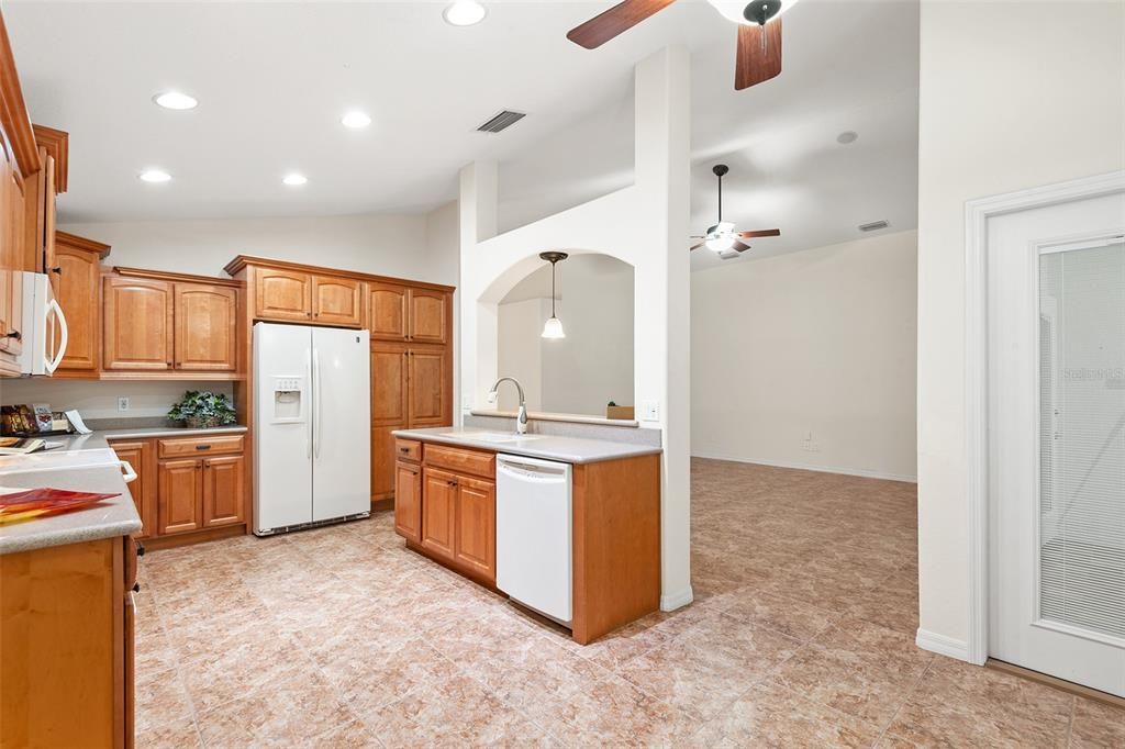 KITCHEN. NOTE PANTRY CABINETRY TO RIGHT OF REFRIGERATOR