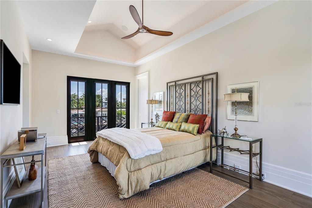 Elevate your living experience to new heights in the upstairs primary bedroom, featuring a generous sitting room and breakfast bar—a haven of refinement that effortlessly doubles as a second-floor primary retreat