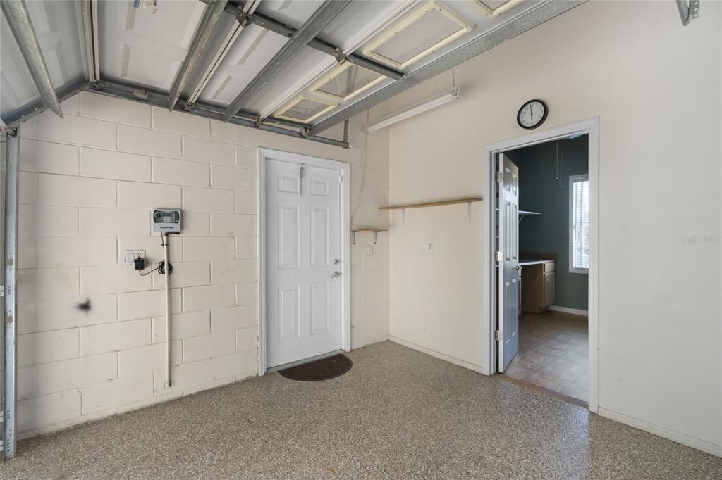 Garage has rear entry great for golf cart storage and a bonus room