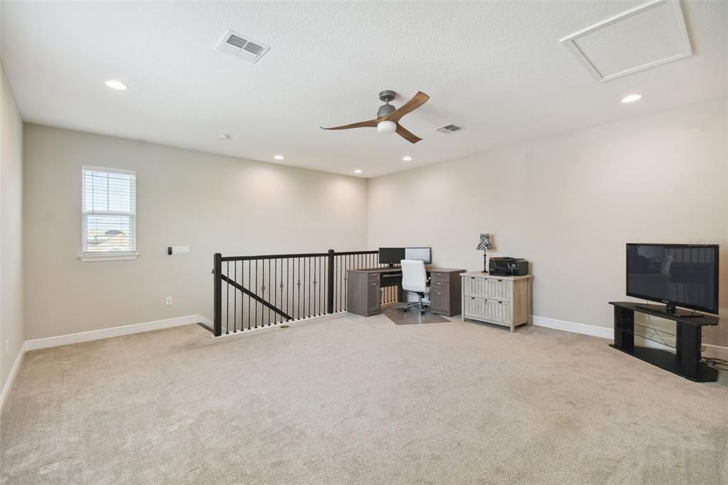Upstairs, you'll find a large bonus room 18'6 x 15'4 with a full bathroom and walk-in closet, perfect for a 5th bedroom or a versatile living space.
