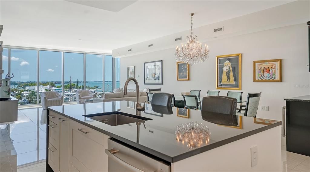 Views abound from dramatic black-and- white kitchen