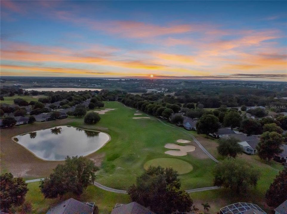 Breathtaking sunsets, overlooking pond and hole 3 on the Executive Ridge Course.