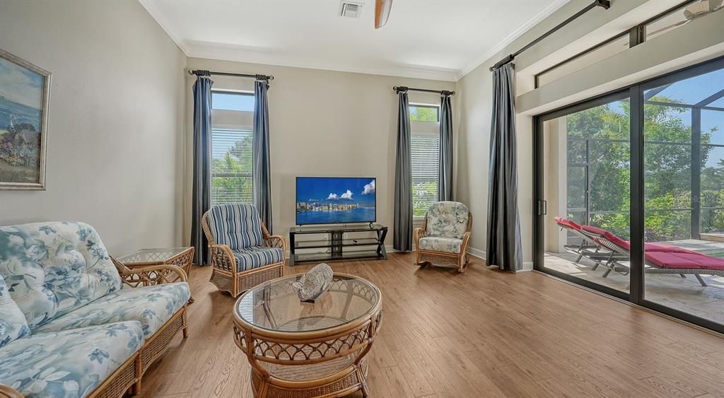 Two sliding doors open to the pool.