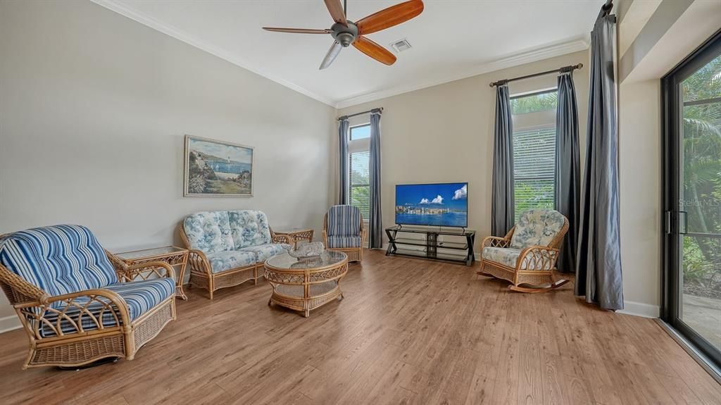 First floor large bonus room with engineered wood flooring