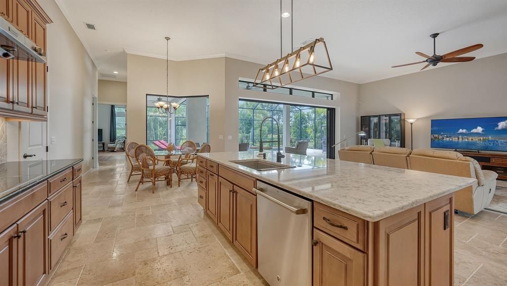 Breakfast nook overlooks the pool through a "fish bow" style window