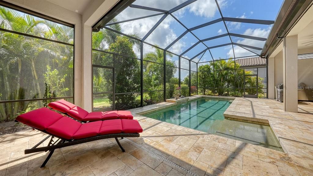 This spacious lanai provides plenty of space for relaxing