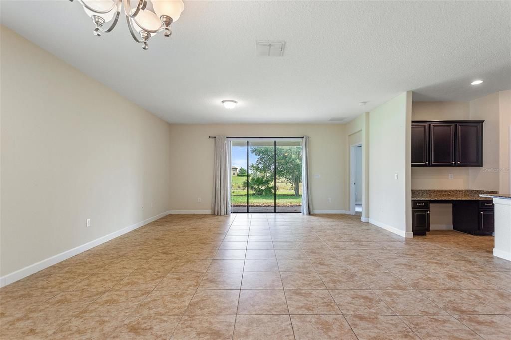 Formal Dining room and family room with views of golf course.