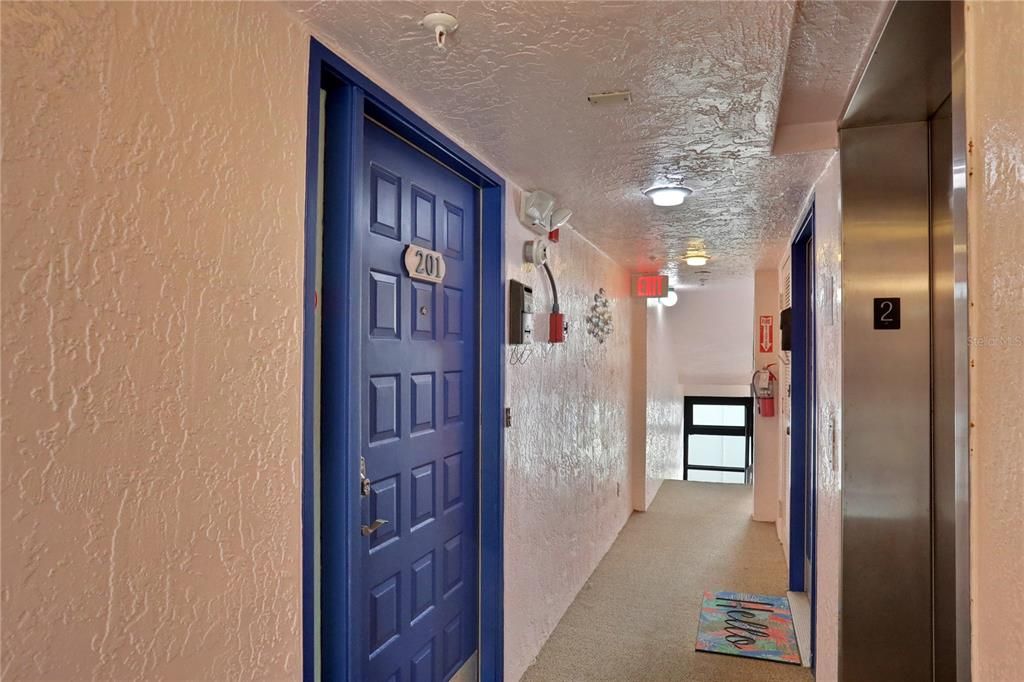 Front door to your slice of paradise is conveniently located across from the elevator