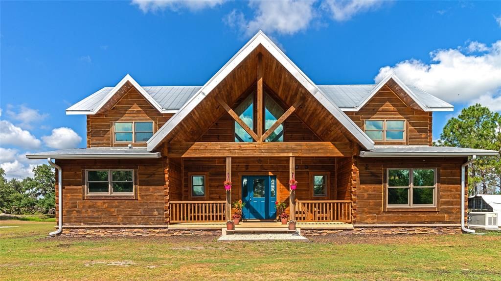 Amazing front Eastern view of this custom built log home!
