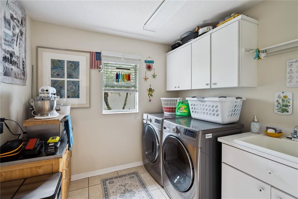 Convenient Laundry Room off Kitchen