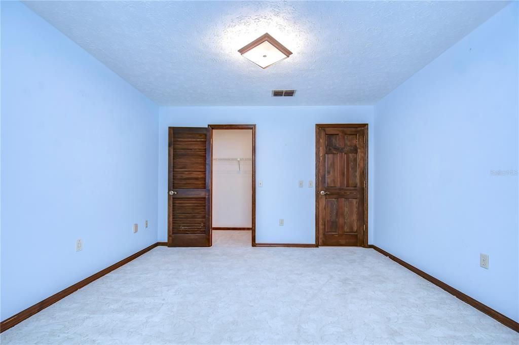 Fourth bedroom features walk-in closet!
