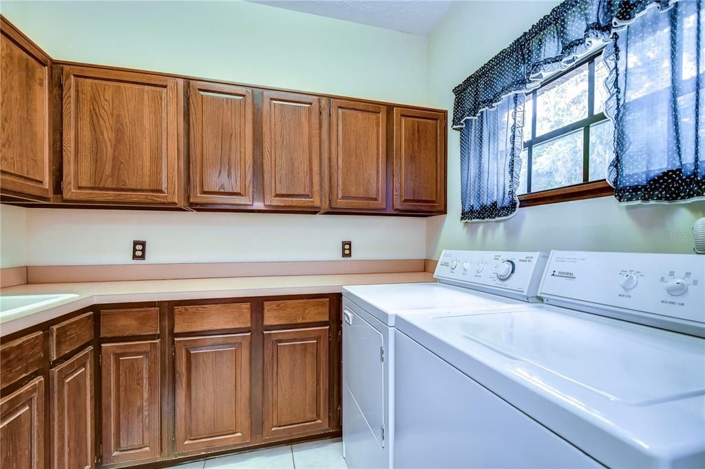 Tons of added storage in laundry room!