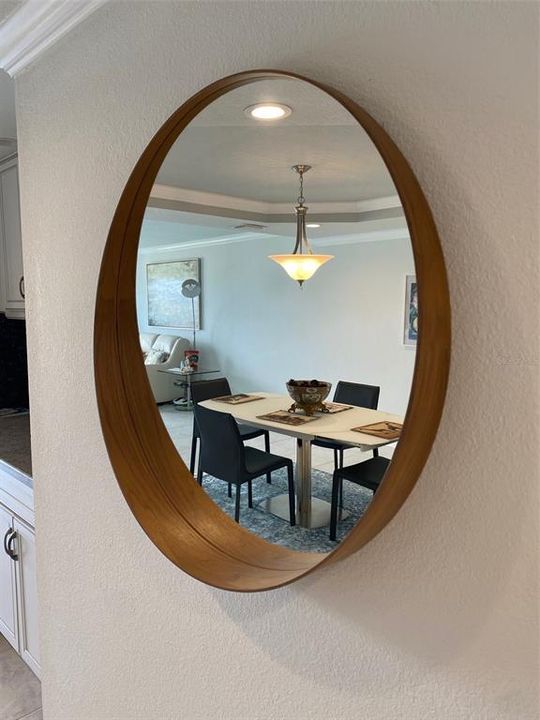 mirror with dining area view