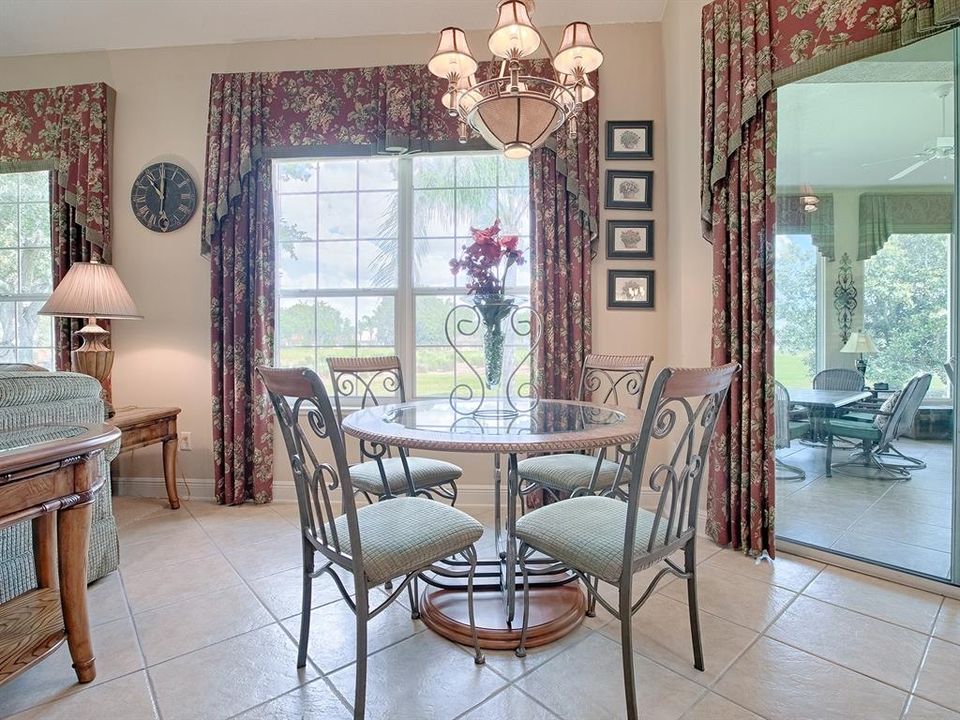 CASUAL DINING AREA OFF THE KITCHEN FLOWS INTO THE FAMILY ROOM.