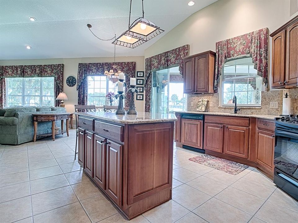 SPACIOUS OPEN KITCHEN WITH LARGE ISLAND.