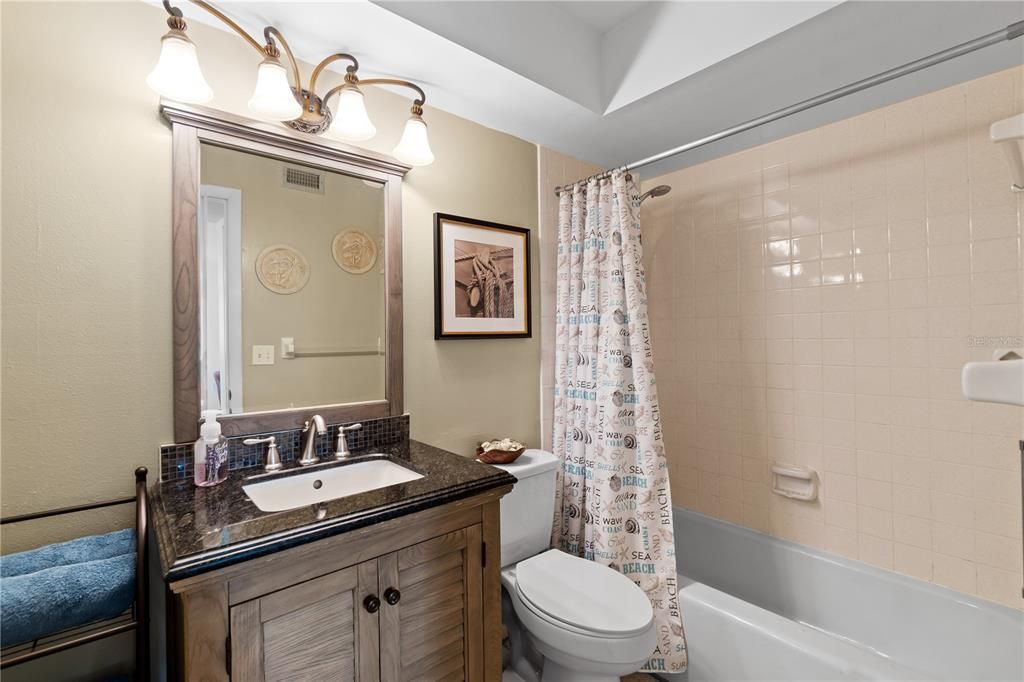 Guest Bathroom - Tub with shower
