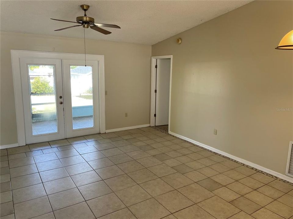 Living Room with Master Bedroom Door