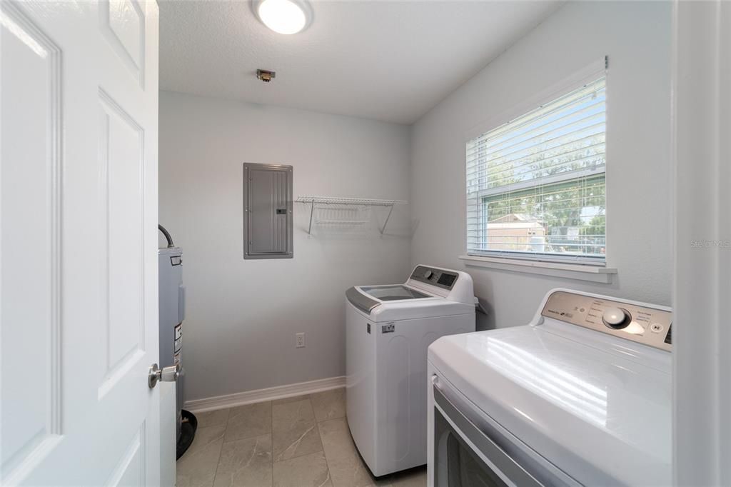 Inside laundry attached to garage. Doubles as a mud room.