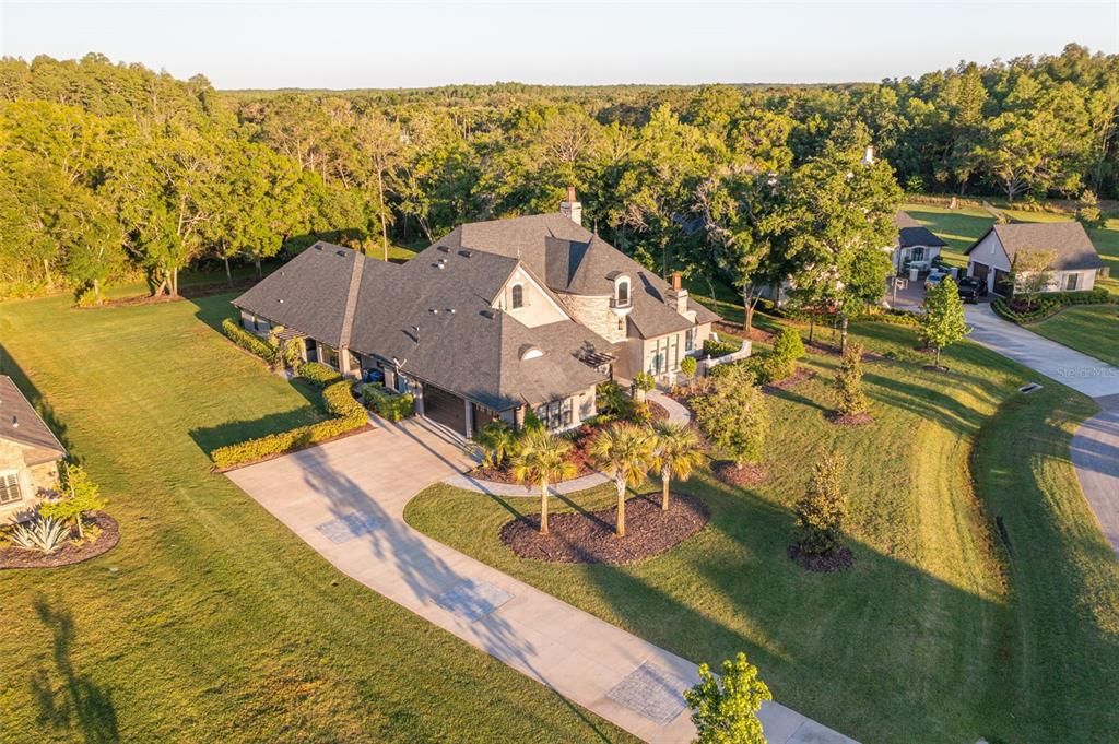 Ample driveway, leading up to 3 car garage.