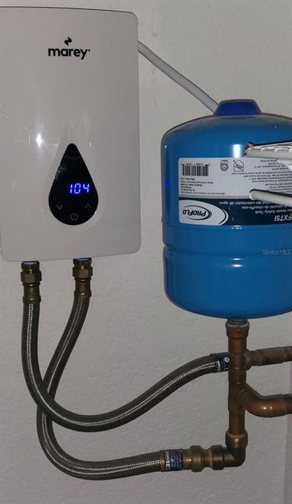 Tankless water heater from 2022. More closet space!