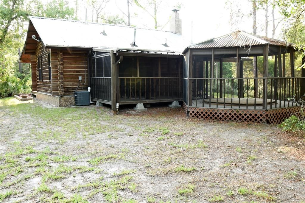 Back of Cabin- screened in gazebo and porch