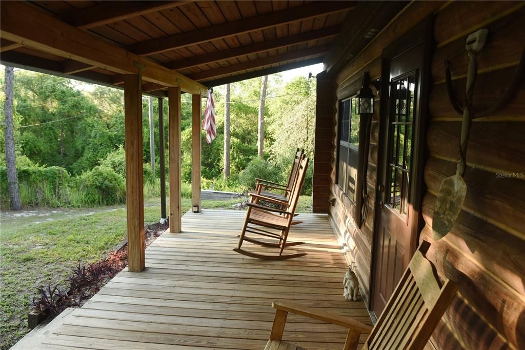 Porch runs full length of cabin