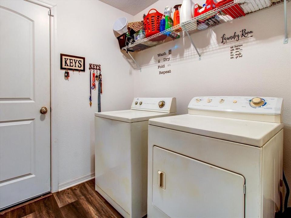 Indoor Laundry Room  With Luxury Vinyl Floors