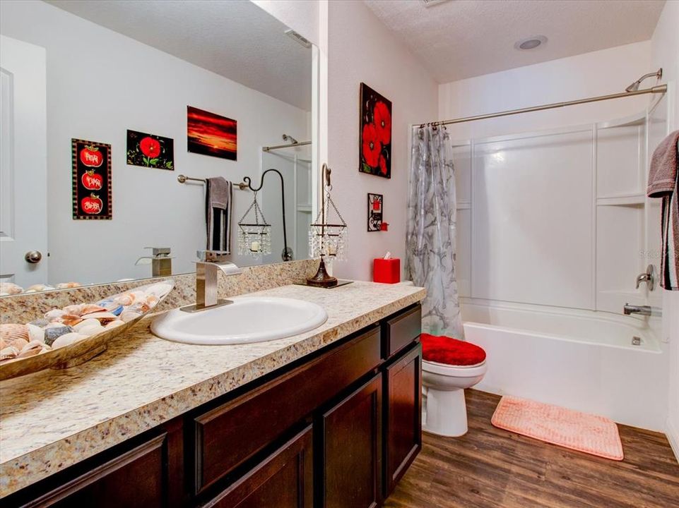 Bathroom 2 WithTub/Shower Combo With Luxury Vinyl Flooring