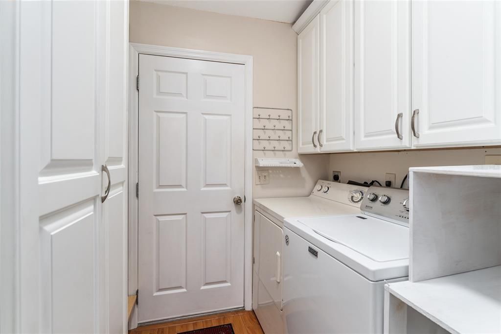 LAUNDRY ROOM WITH ADDED PANTRY STORAGE