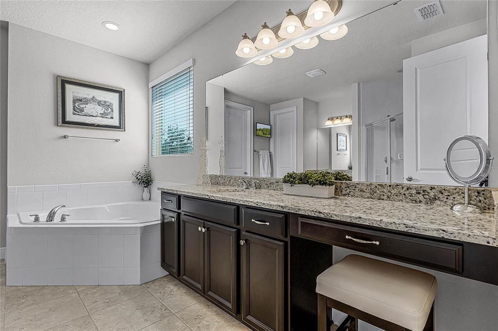 luxurious bath with dual vanities