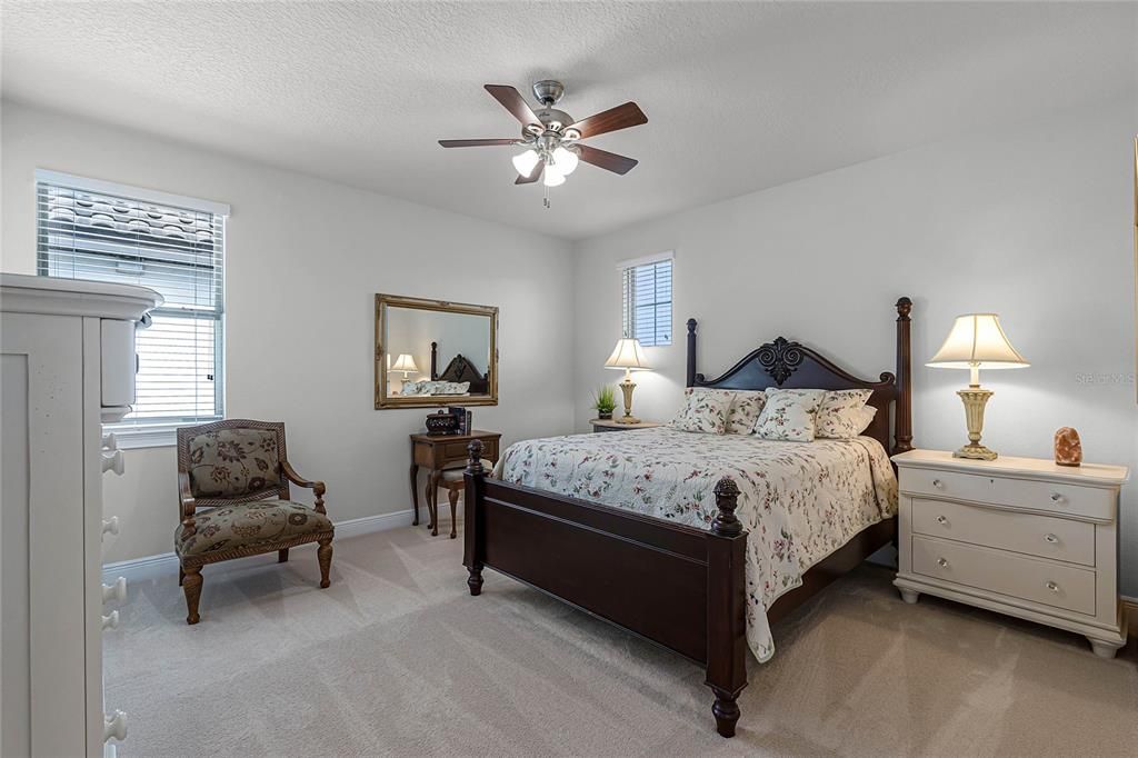 third bedroom with ceiling fan