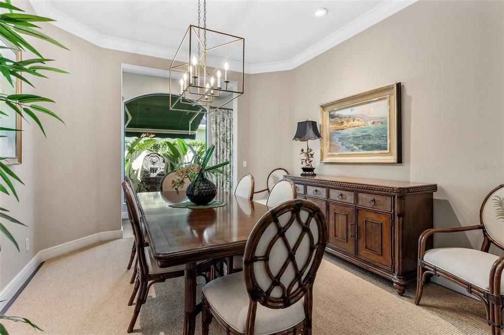 Entertain in Formal Dining Room overlooking Courtyard with Wall Fountain