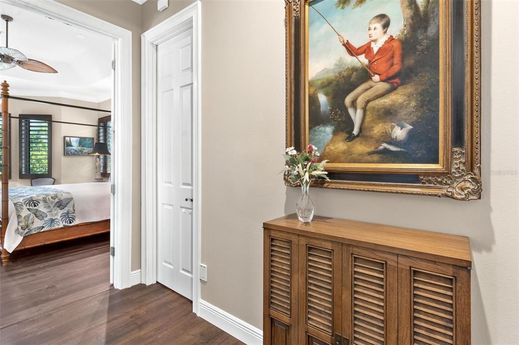 Oversized Private Hallway leads to Primary Suite and Walk-in Closets