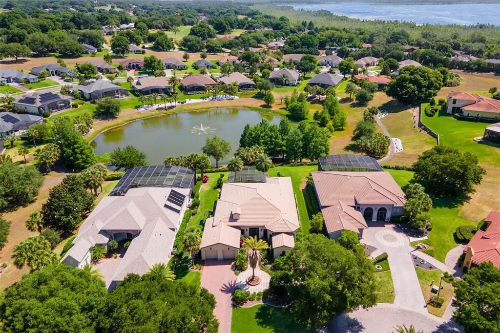 Aerial of Home, Pond with Fountain and Chain of Lakes "Lake Griffin"