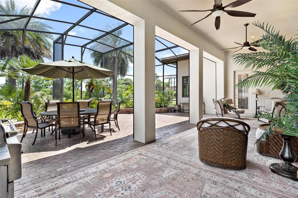 Spectacular Lanai with Recessed Hurricane Shutters and Birdcage with Amazing Elevated View of Pond Front