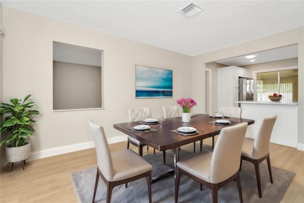 Virtually Staged, possible dining area, eat-at bar.