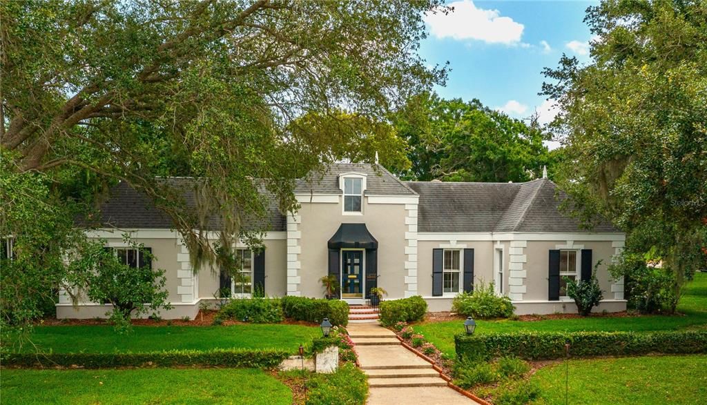 Lovely French inspired 3/3.5 home on beautiful corner lot, in great neighborhood.