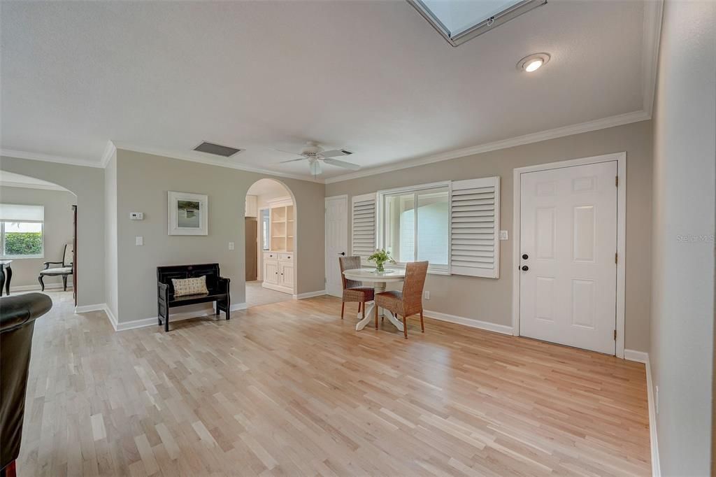 Living room view of entrance/dinette area