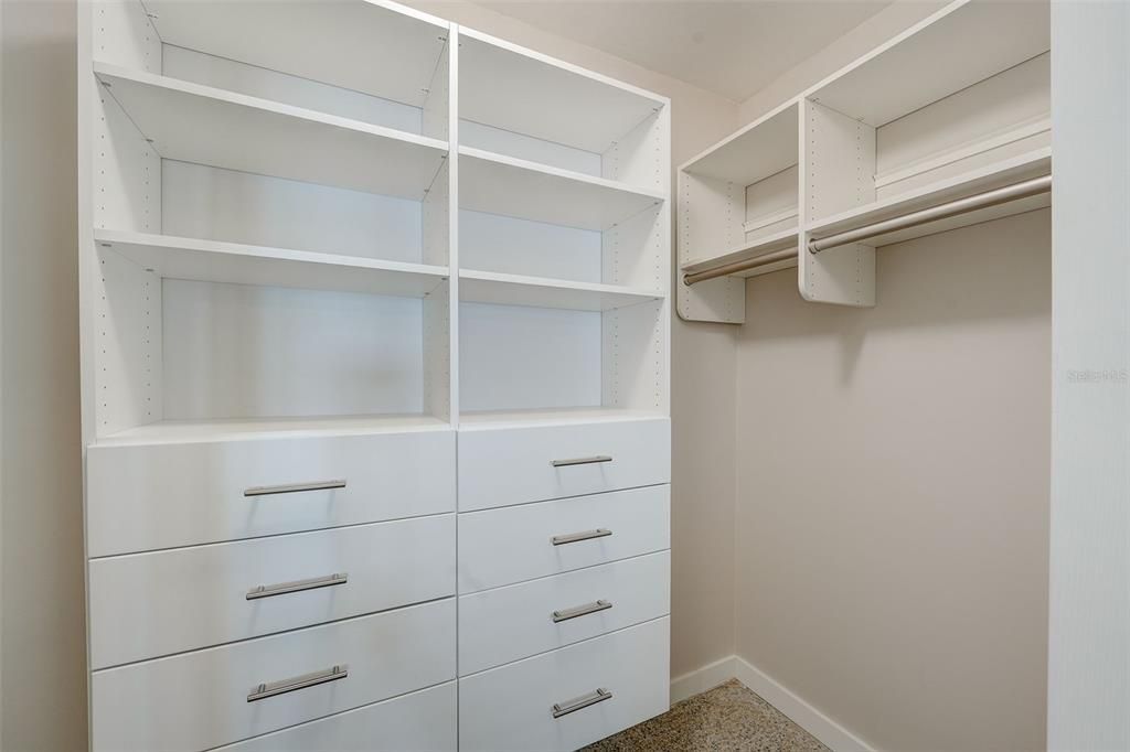 Bedroom 2 walk-in closet with custom shelves