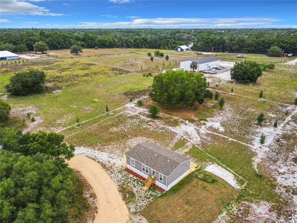 Property is 330' x 330' property goes to oak on the far left of photo