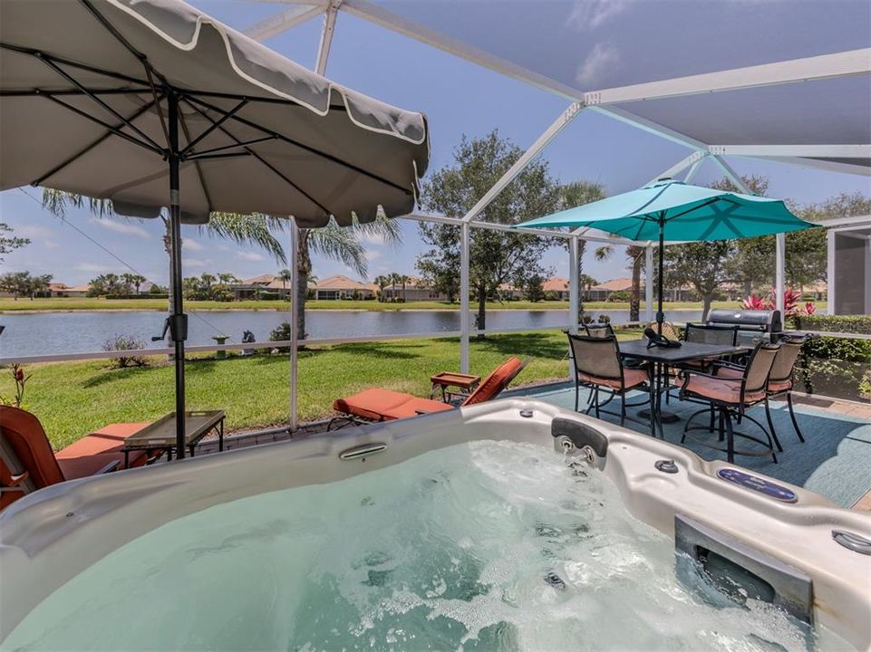 Spectacular water views on your extended lanai with hot tub! The perfect place to watch sets