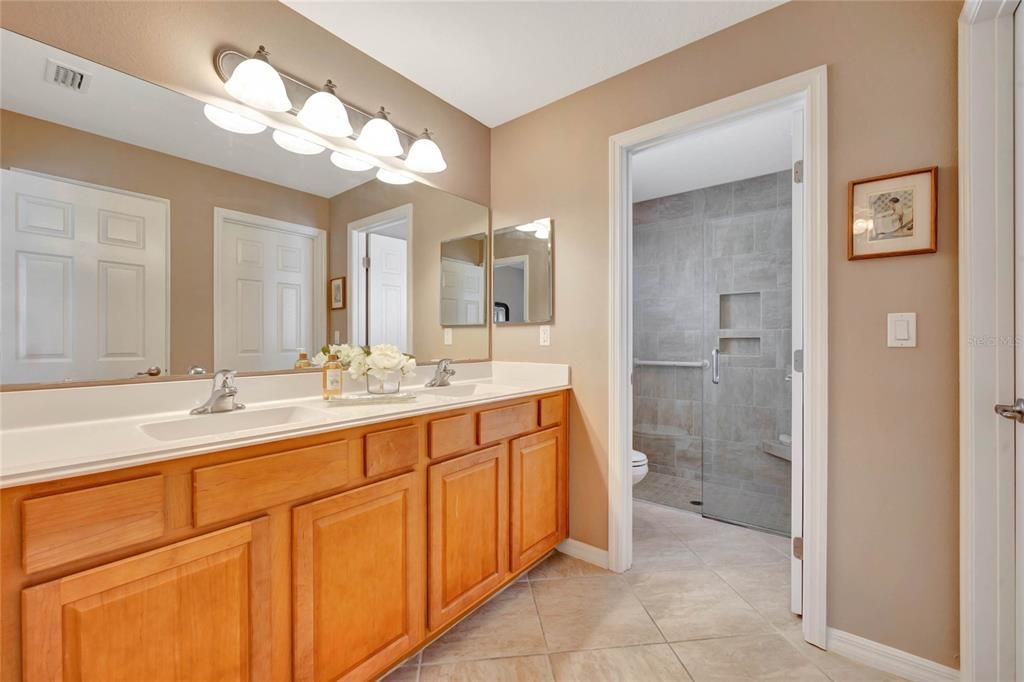 Primary Bath with New Countertop & Updated Seated Walk in Shower