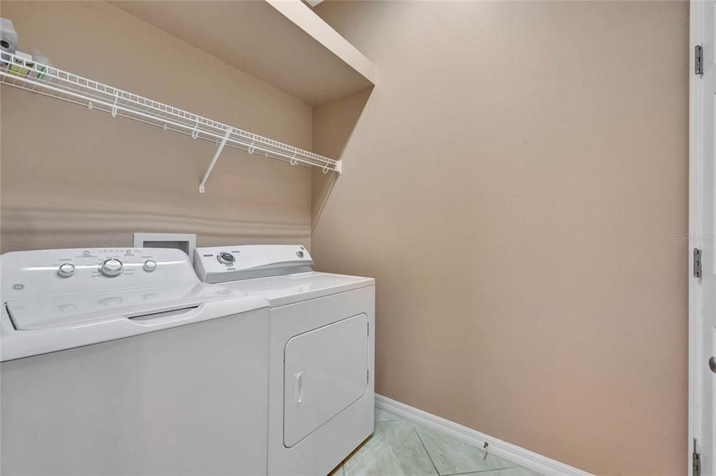 Laundry Room includes Washer, Dryer and Luggage Shelf