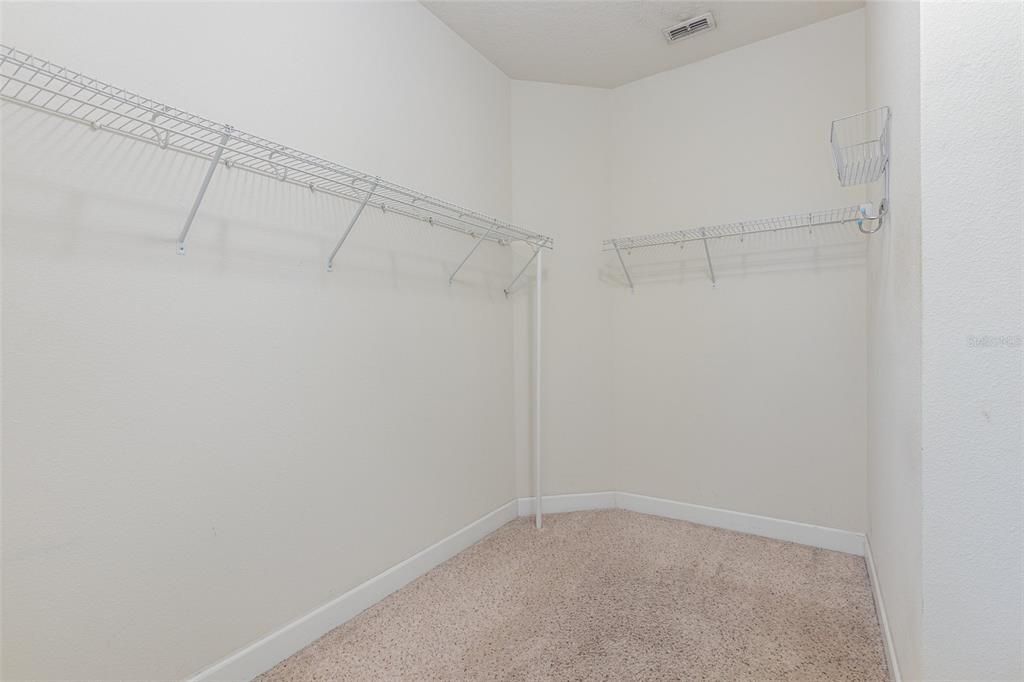 Large walk-in closet that could be made into seasonal closet
