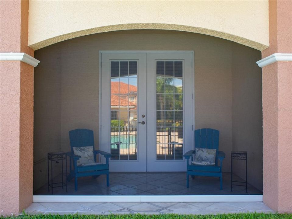 Back porch with motorized screen down