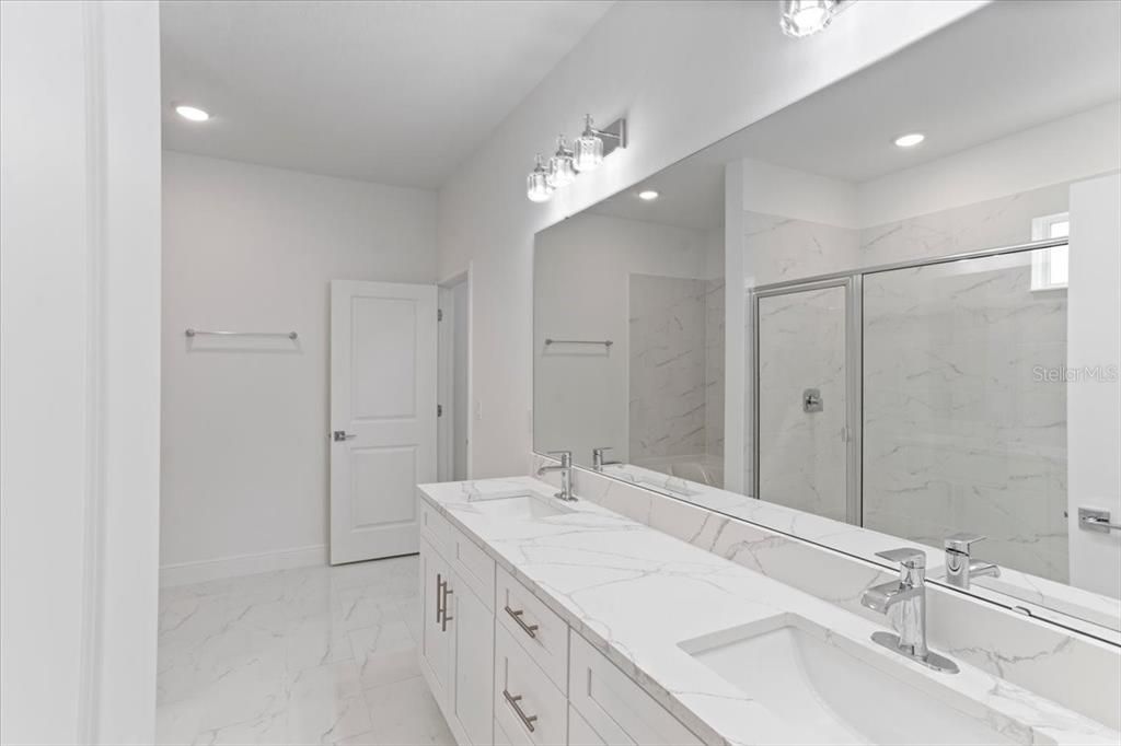 Owners Bathroom with Double Vanity Sinks