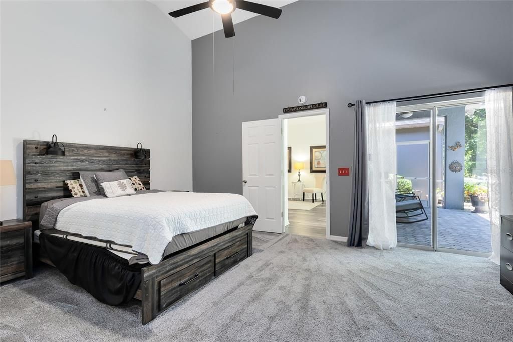 Giant master bedroom with views out back.