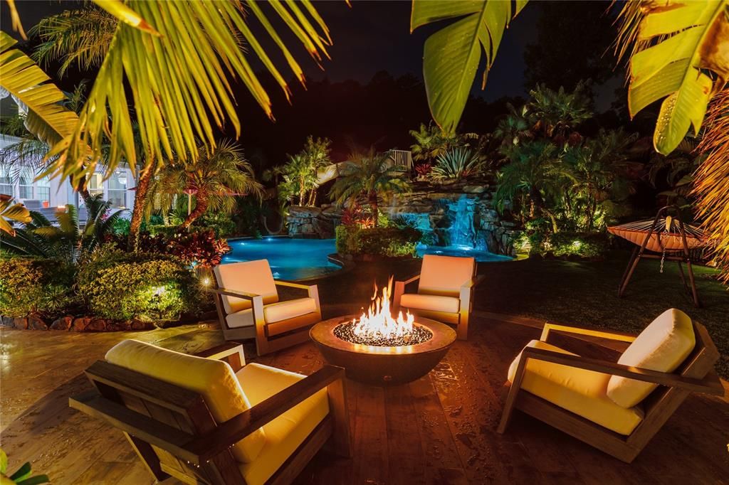 Seating area with gas fireplace by the pool
