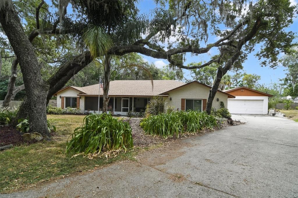 Everything you could want and more - an established community, OVER HALF AN ACRE CUL-DE-SAC LOT, UPDATES - ROOF, FLOORING & INTERIOR PAINT (2024!), WINDOWS (2022), A/C (2017) and a DETACHED 4-CAR GARAGE/WORKSHOP in addition to the 2-CAR ATTACHED GARAGE - welcome to Cinnamon Bark Lane!
