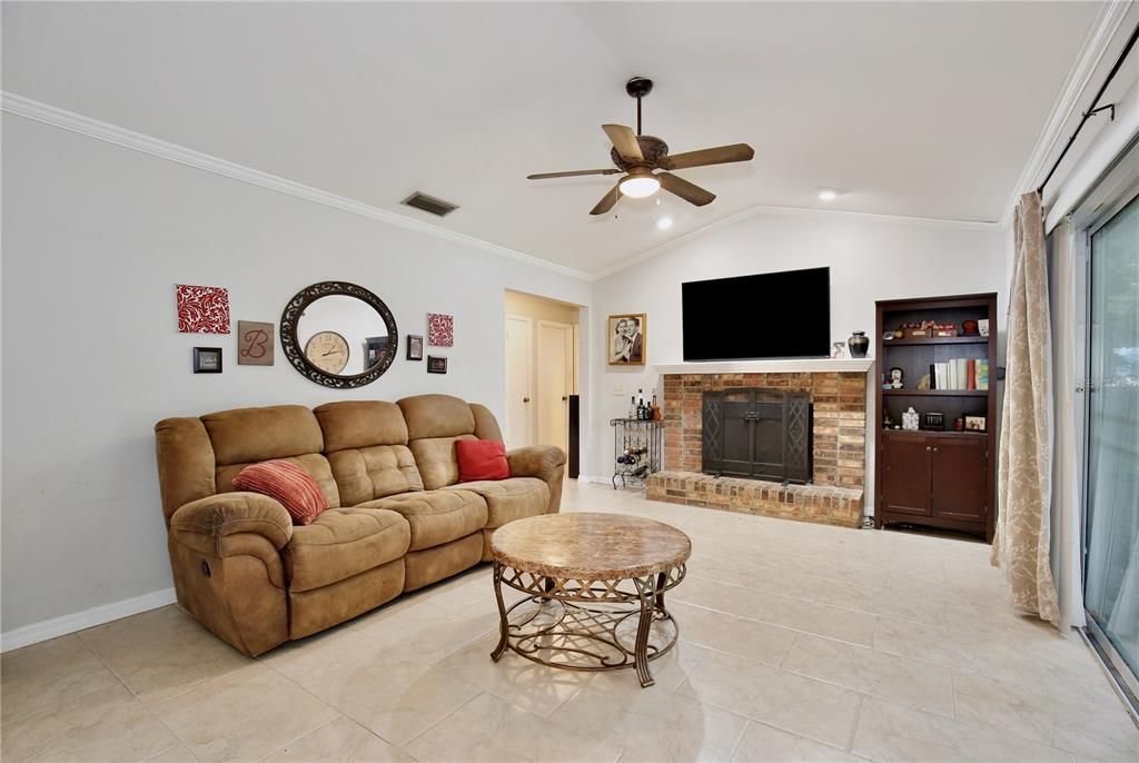 Family room with wood burning fireplace